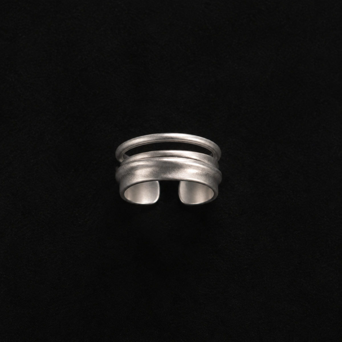 Back view of the Ripple Band Ring in studio light