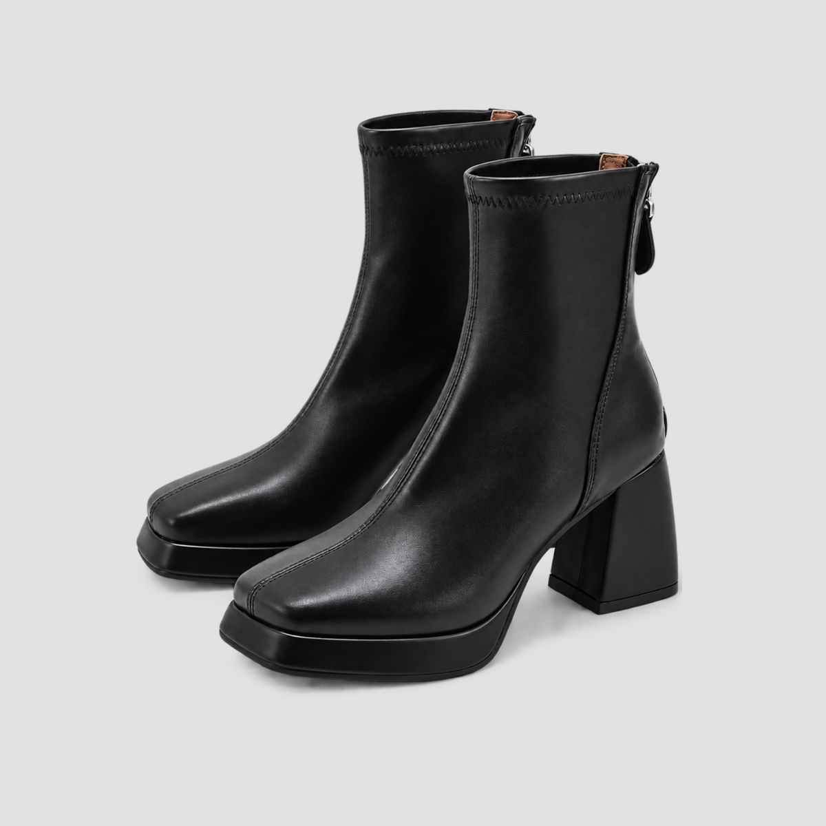 Pair of Risa Square-Toe Chunky Heel Ankle Boots in black, shown from a forty-five-degree angle