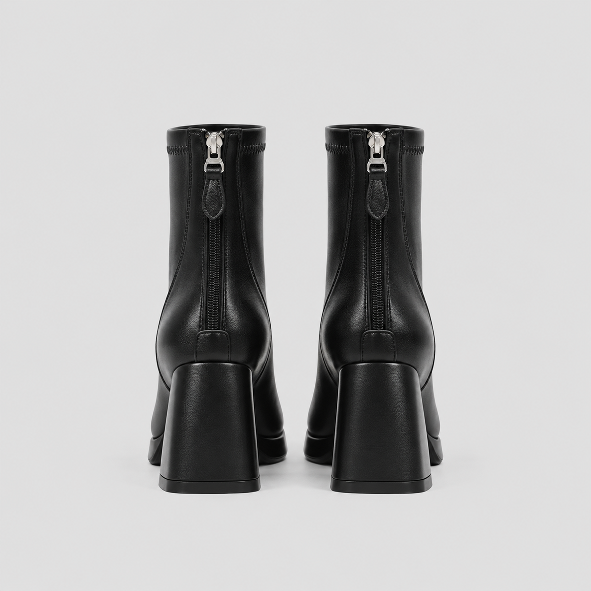 Rear view of Risa Square-Toe Chunky Heel Ankle Boots in black, showing heel shape