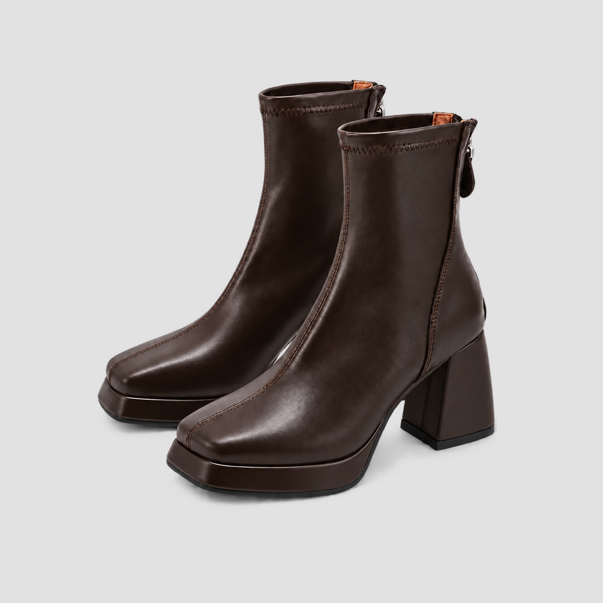 Pair of Risa Square-Toe Chunky Heel Ankle Boots in brown, shown from a forty-five-degree angle