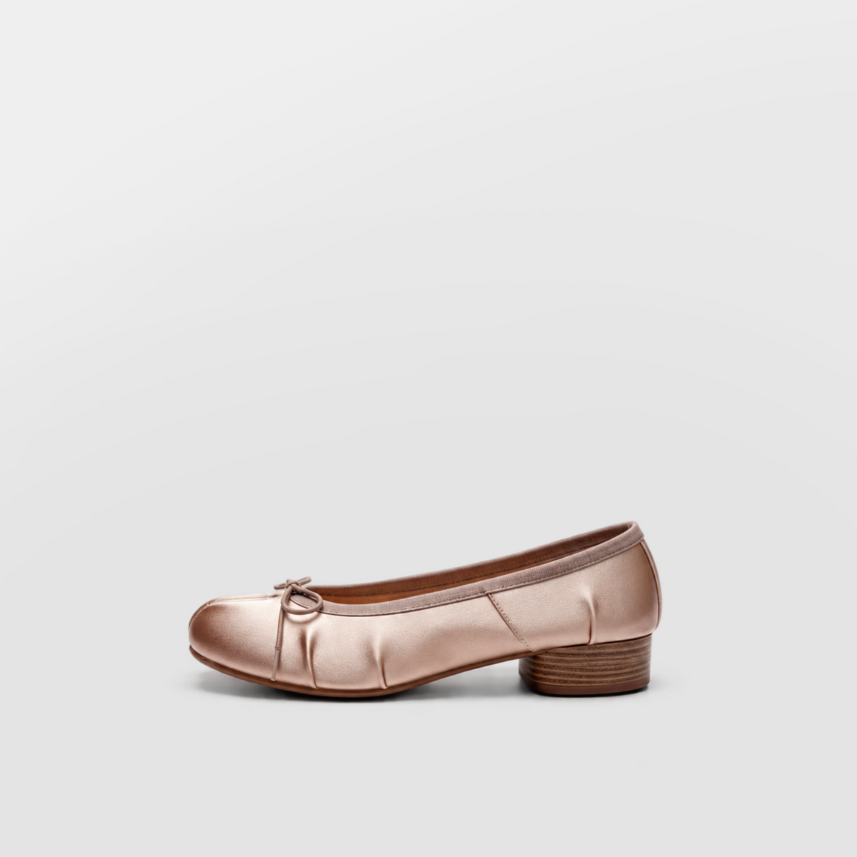Champagne satin tabi ballerina pump shown alone in profile on a low stacked block heel
