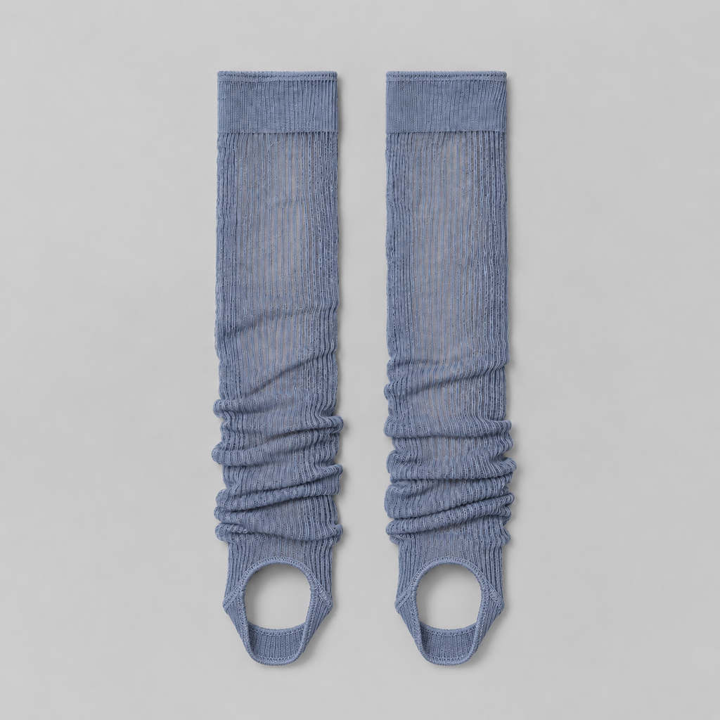 Lil Cacti haze blue ruched stirrup leg warmers laid flat on a pale background
