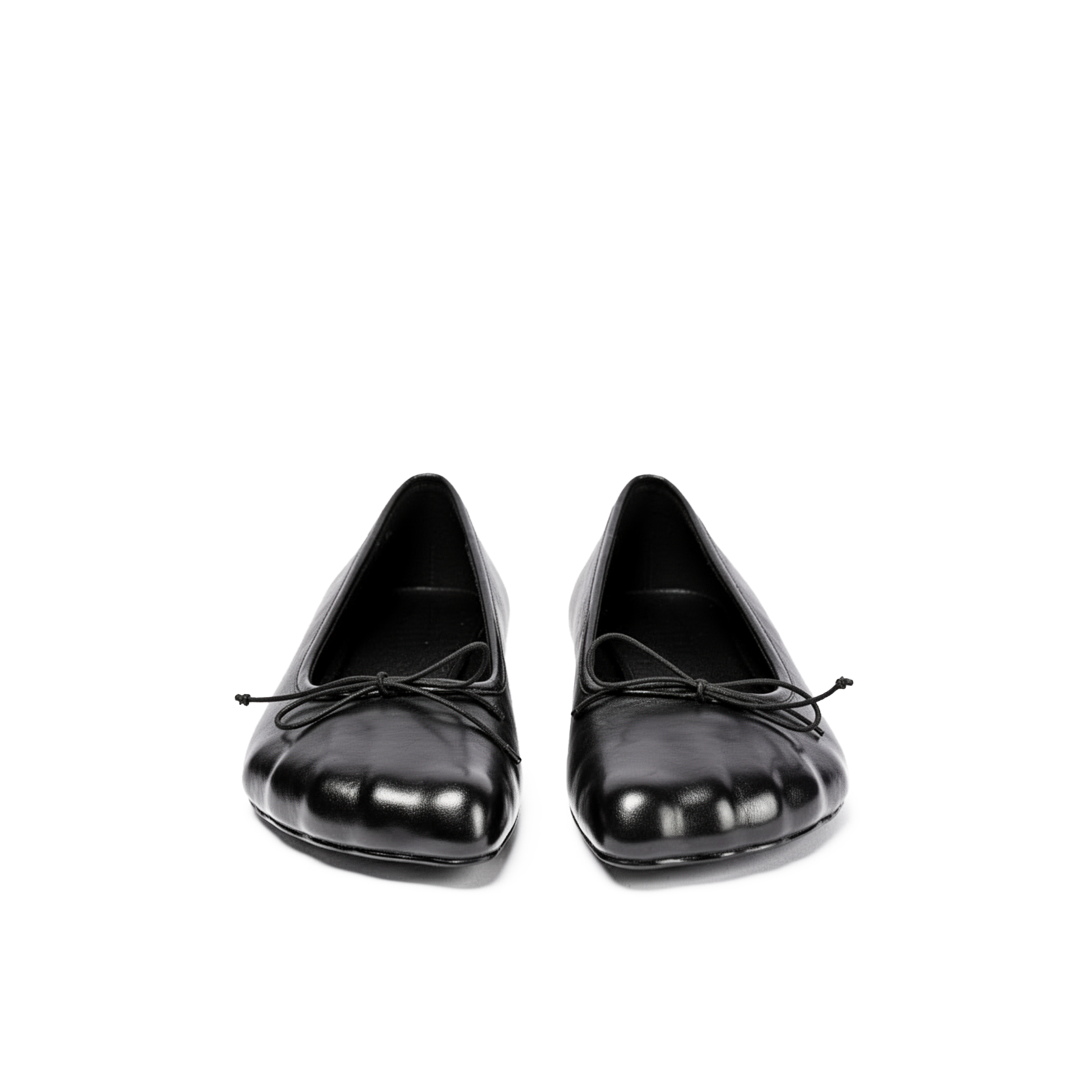 Rune Toe flats close-up — distinctive toe shape detail in black