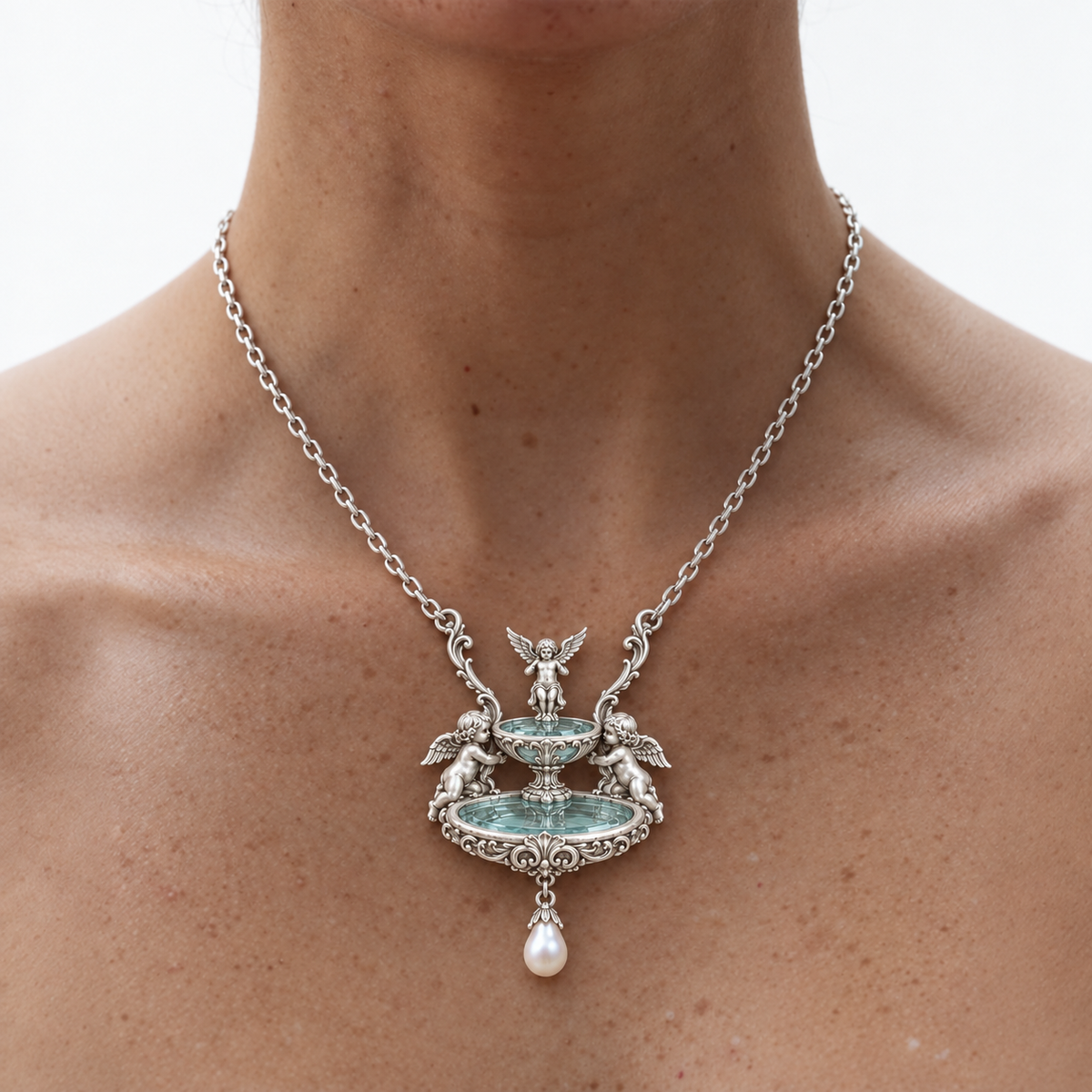Model wearing the Seraph Angel Necklace with the fountain pendant seen from the front