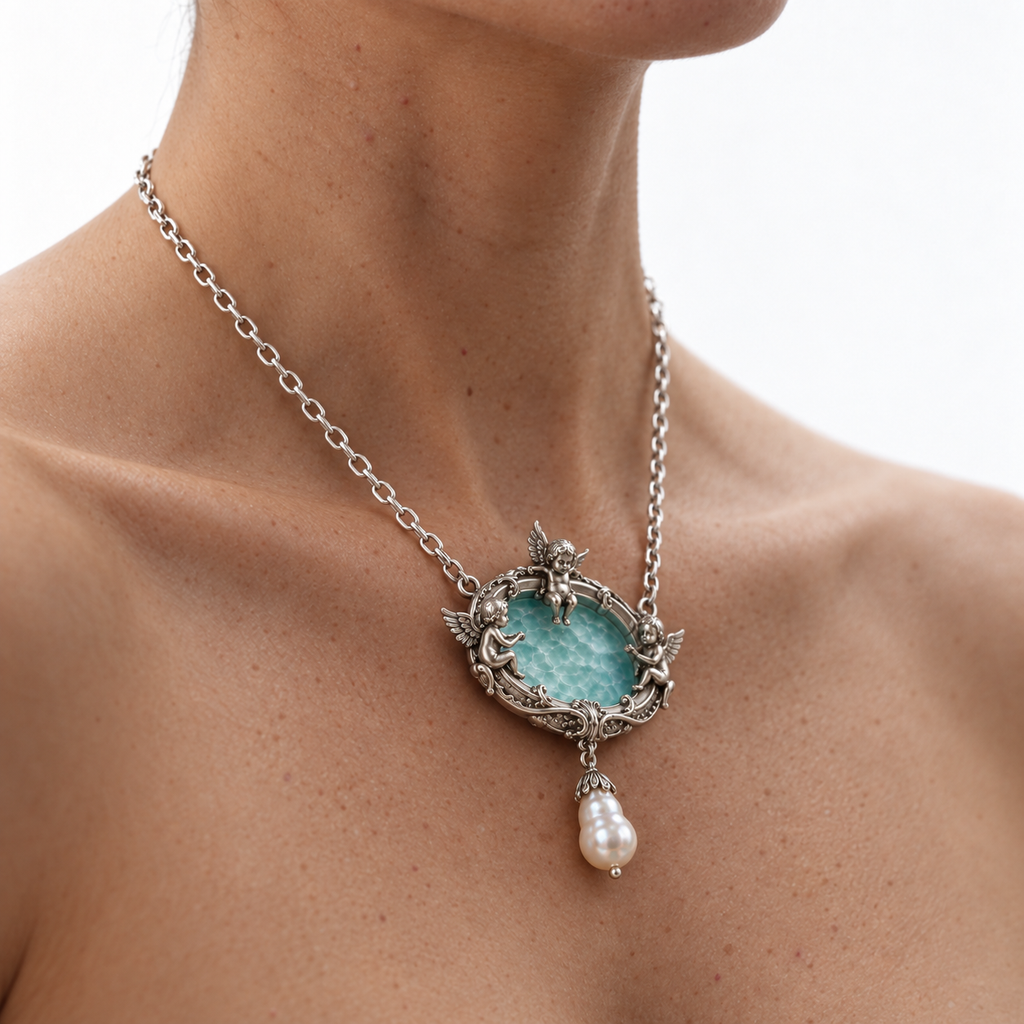 Model wearing the Seraph Angel Necklace with the pool pendant seen from the side