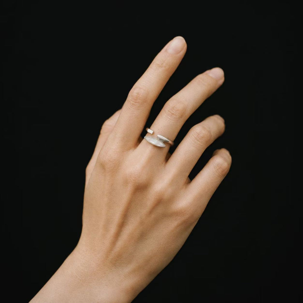 Model wearing the Shard Marquise Open Ring, three quarter view