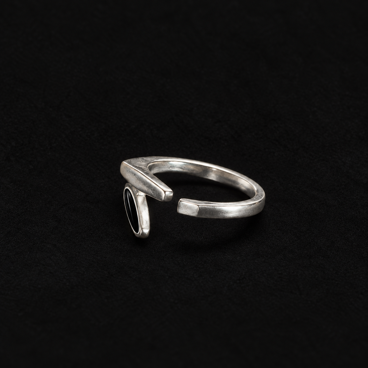 Close detail of the Shard Marquise Open Ring surface and finish