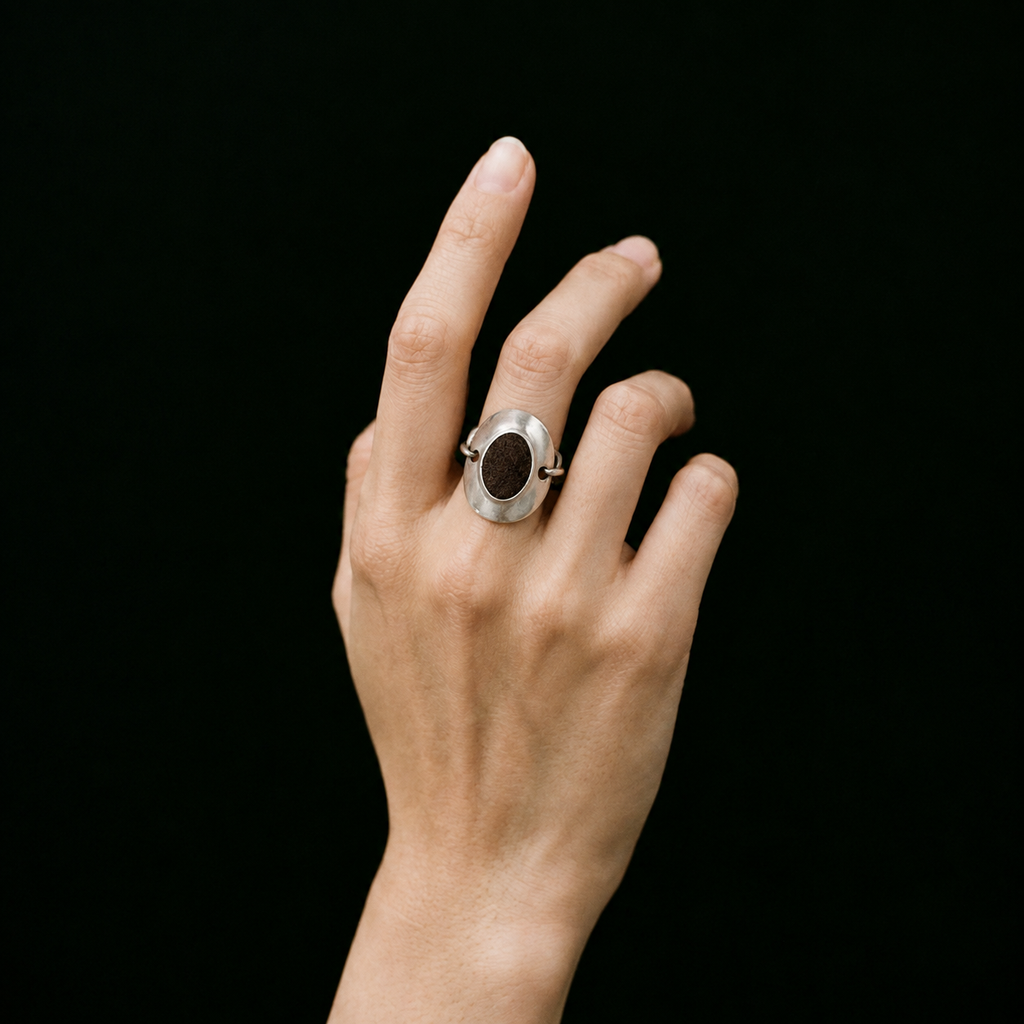 Model wearing the Inlay Signet Ring seen from the side