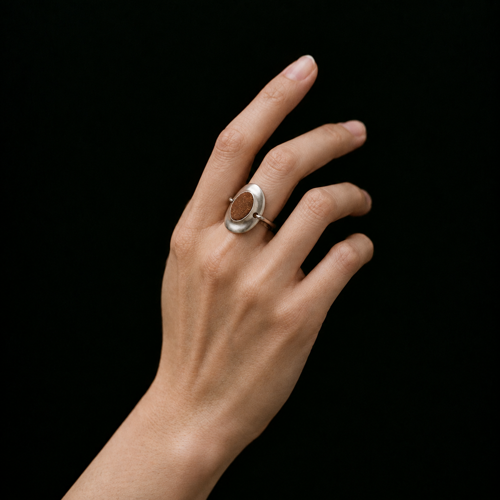 Model wearing the Inlay Signet Ring seen from behind