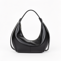 Solea crescent shoulder bag in mousse black, front view on white background — Lil Cacti