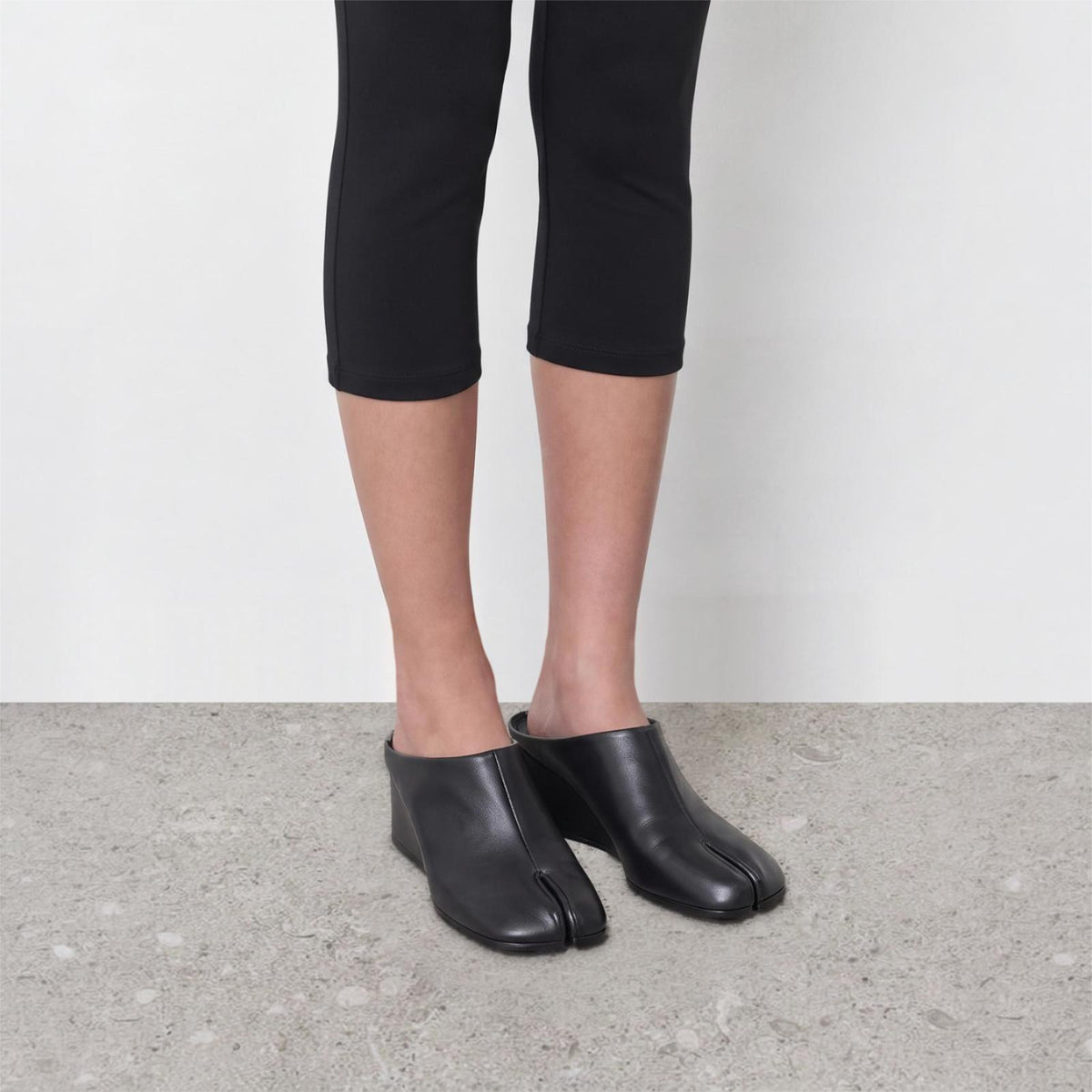 Model wearing Solene Tabi Wedge Slides by Lil Cacti, view 2