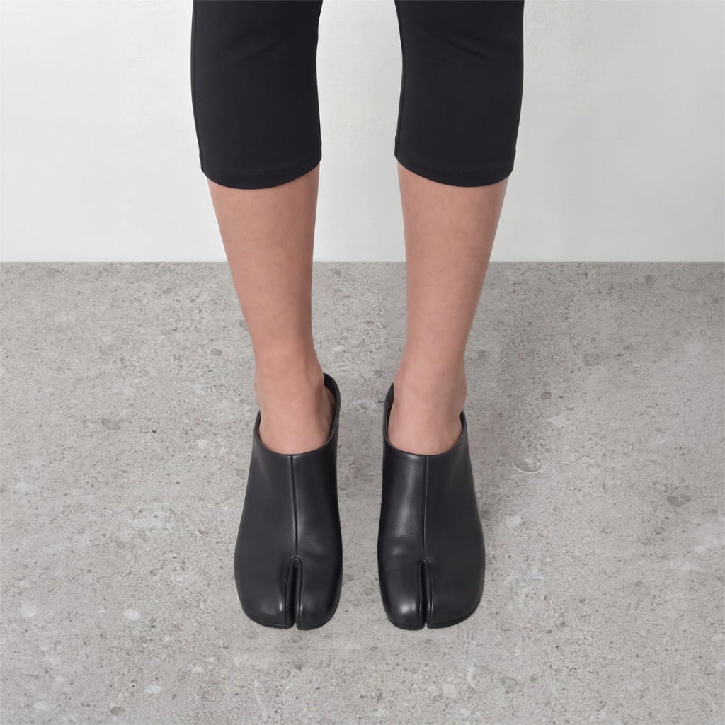 Model wearing Solene Tabi Wedge Slides by Lil Cacti, view 3
