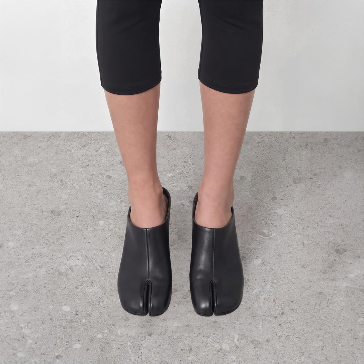 Model wearing Solene Tabi Wedge Slides by Lil Cacti, view 3