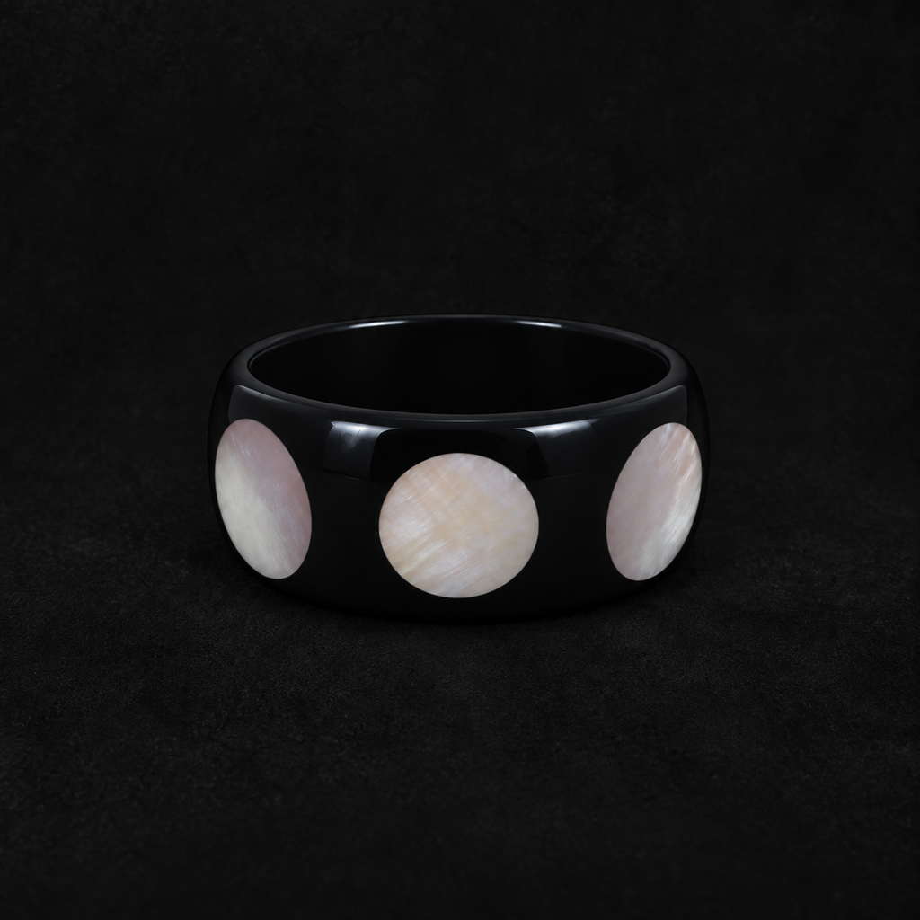 Spotted Chunky Bangle shown at a three quarter angle in studio light