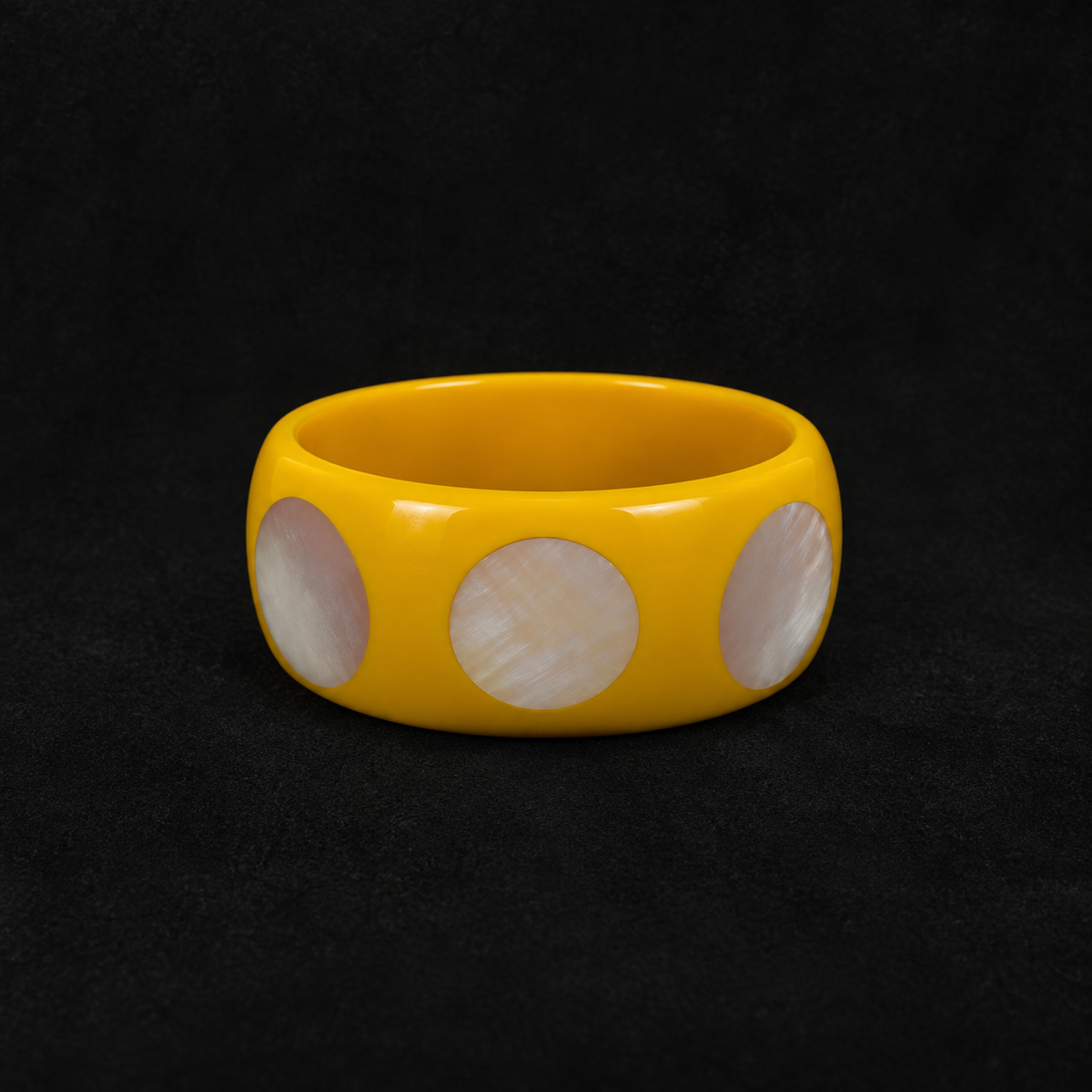Back view of the Spotted Chunky Bangle in studio light