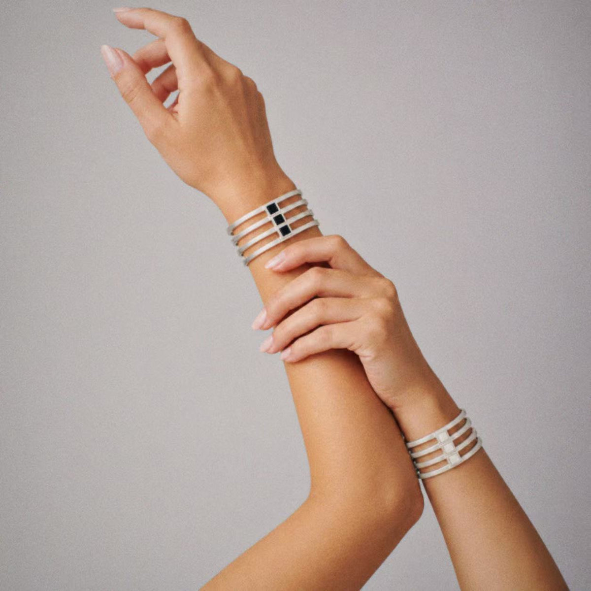Model wearing the Strata Wide Cuff Bracelet from a side angle