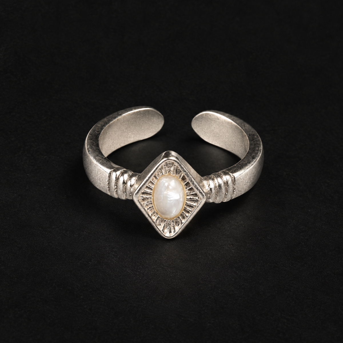 Lil Cacti Art Deco adjustable ring showing shape and finish on dark background