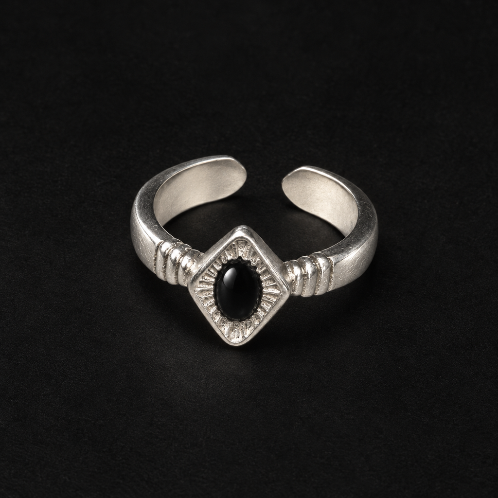 Lil Cacti Art Deco adjustable ring showing shape and finish on dark background