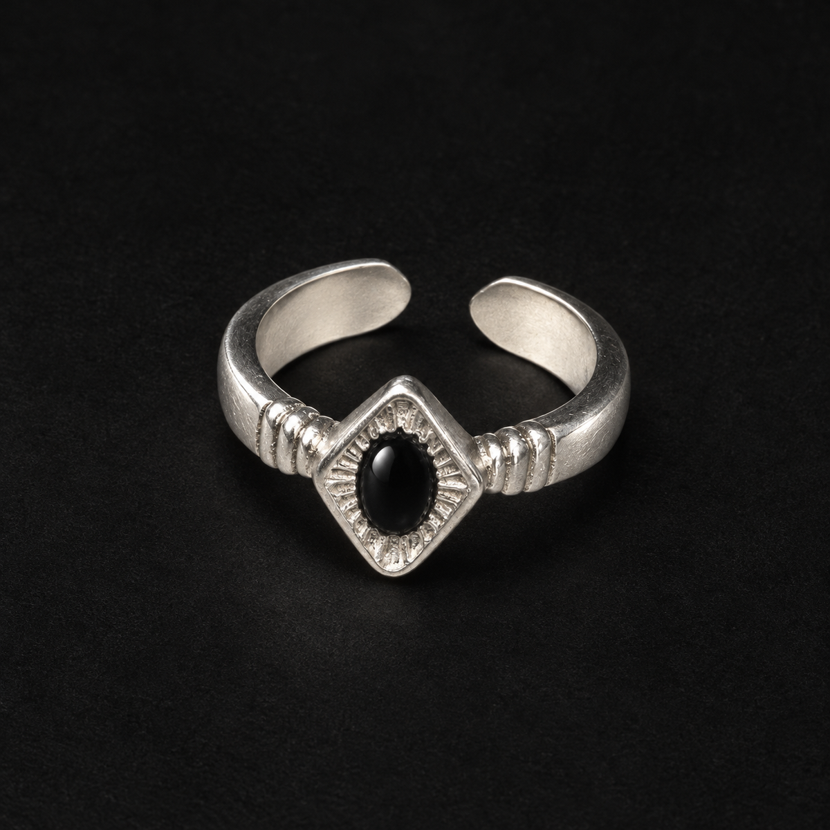 Lil Cacti Art Deco adjustable ring showing shape and finish on dark background
