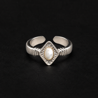 Lil Cacti Art Deco adjustable ring showing shape and finish on dark background