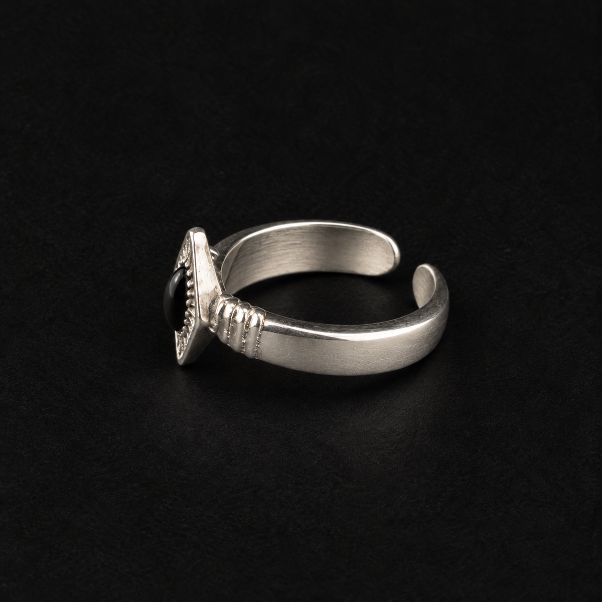 Lil Cacti Art Deco adjustable ring showing shape and finish on dark background
