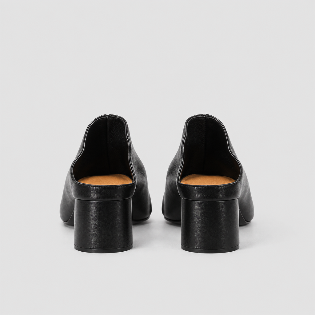 Pair of black tabi block heel mules viewed from behind