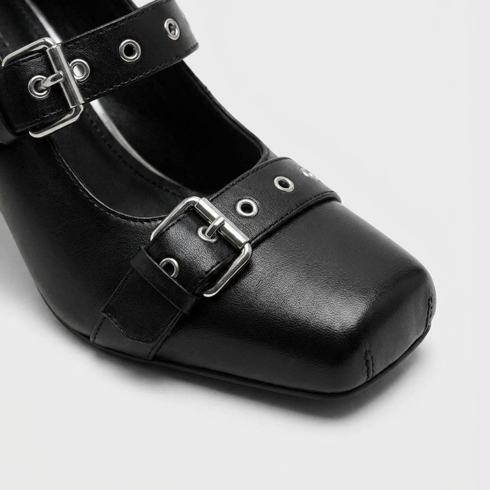 Close-up of buckle and eyelet hardware on Thorne Mary Jane heels