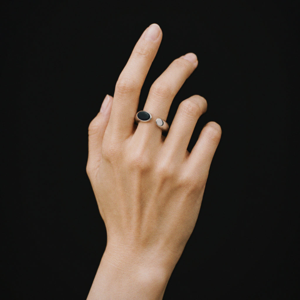 Model wearing Lil Cacti Umbra Oval Signet Ring, close crop on the detail