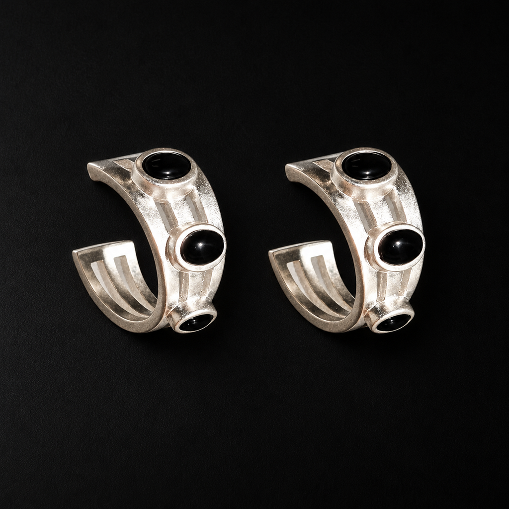 Lil Cacti Vault Black Stone Hoop Earrings shown on its own against a dark background