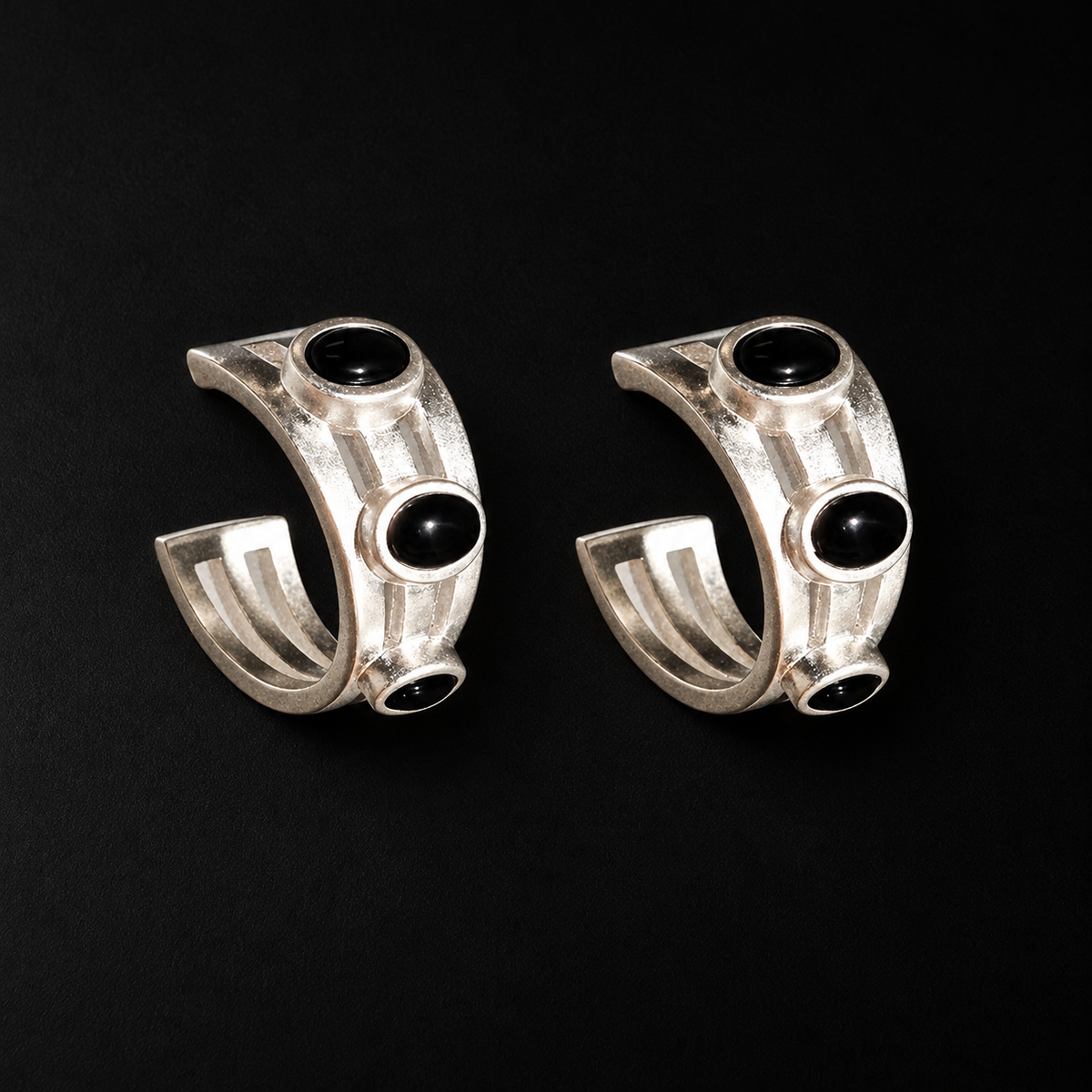 Lil Cacti Vault Black Stone Hoop Earrings shown on its own against a dark background