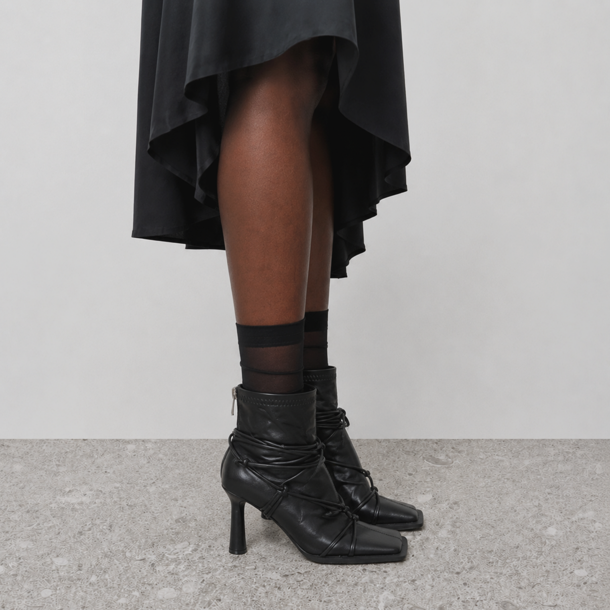 Verity Lace-Up Square Toe Boots by Lil Cacti — on-model side profile showing slim heel, with sheer socks and midi skirt