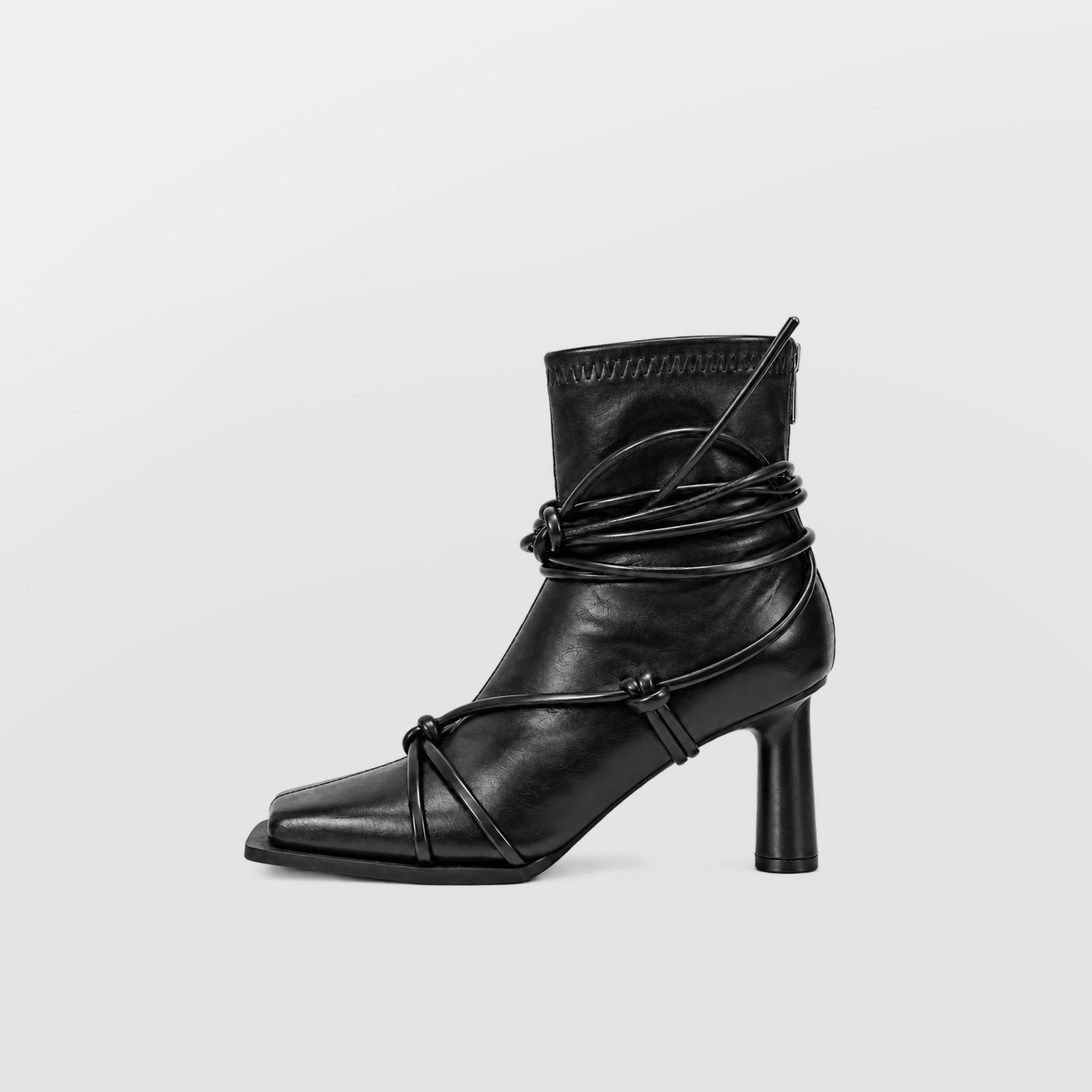 Verity Lace-Up Square Toe Boots by Lil Cacti — side profile of a black square toe ankle boot with wrap-around cord laces