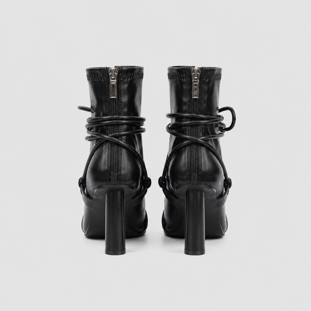 Verity Lace-Up Square Toe Boots by Lil Cacti — pair back view showing silver back zips, wrapped cords and slim round heels