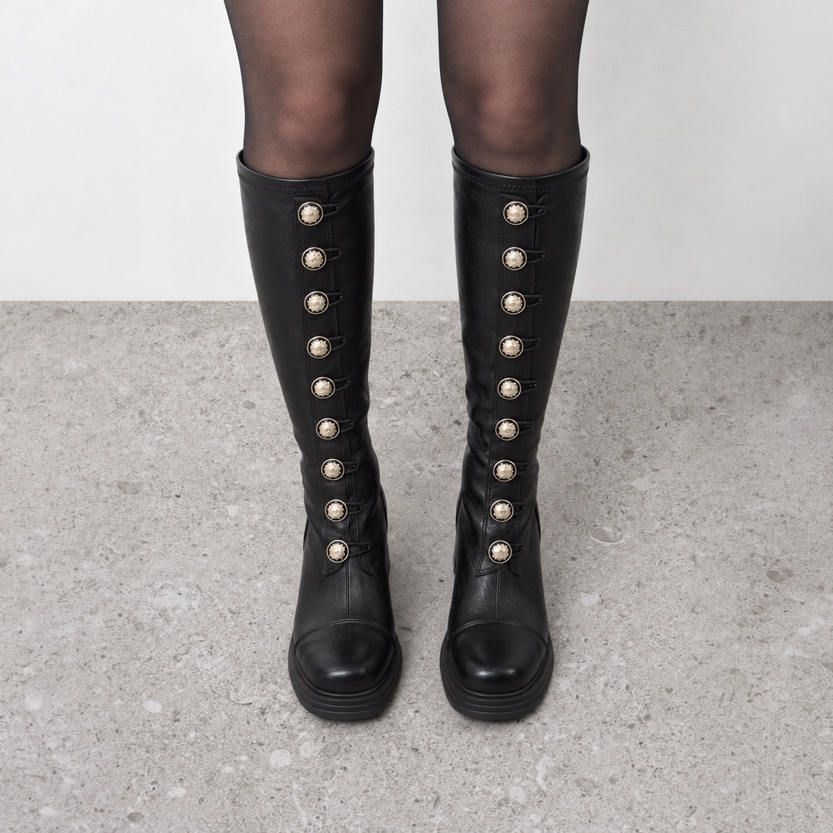 Lil Cacti Vintage Heeled Knee-High Boots in black, model-worn view