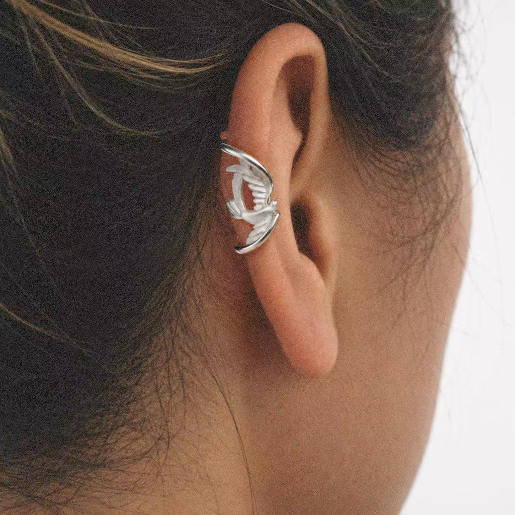 Model wearing the Wing Wrap Ear Cuff seen from behind