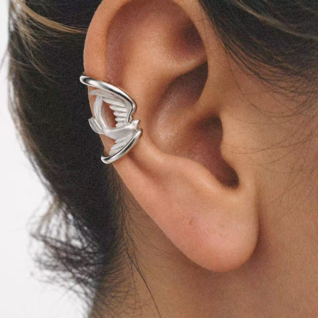 Model wearing the Wing Wrap Ear Cuff in a close crop