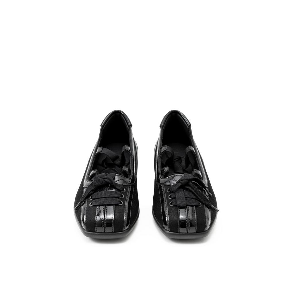 Lace up flats in black patent leather — square toe balletcore silhouette, top view