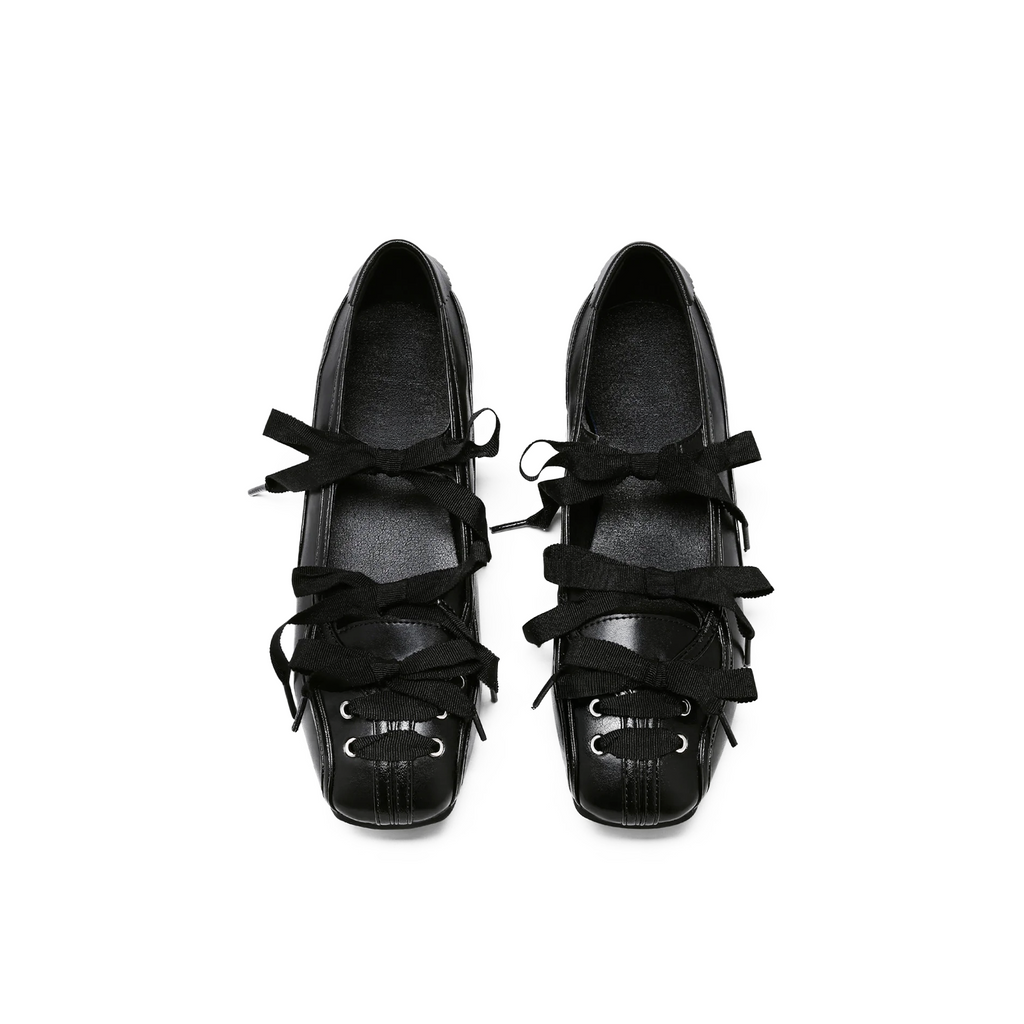 Lace up flats in black patent leather — square toe balletcore silhouette, top view