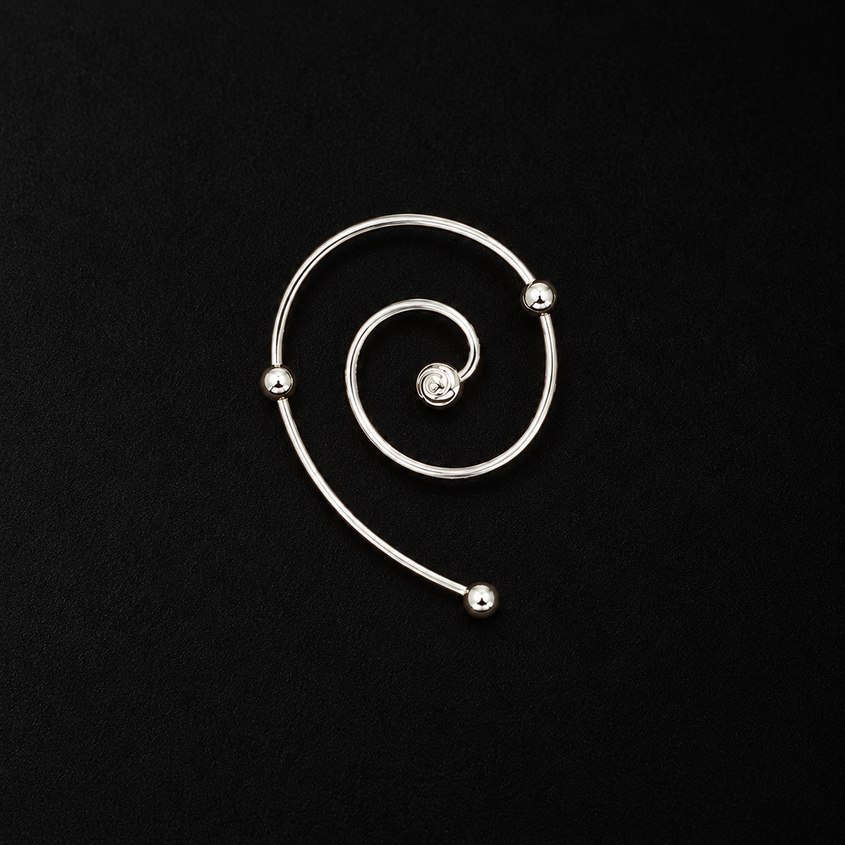 Back view of the Wire Spiral Ear Climbers in studio light