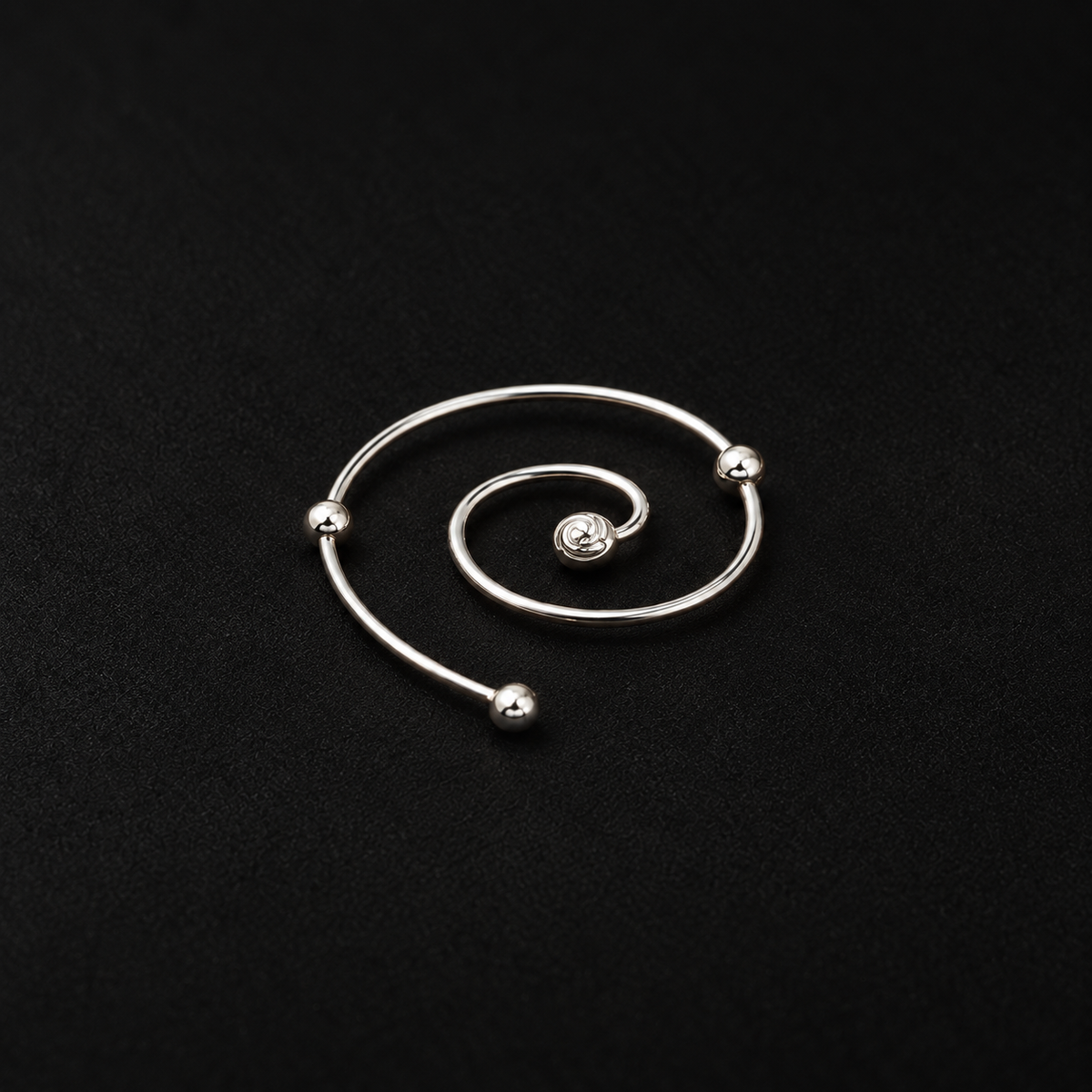 Close detail of the Wire Spiral Ear Climbers by Lil Cacti