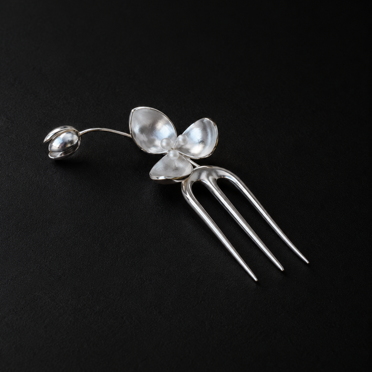 Wisp Orchid French Hair Pin worn in a low bun, french hair pin