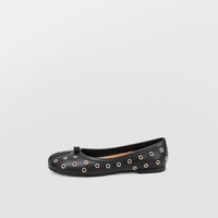 Angled three-quarter view of black leather eyelet tabi flats on pale grey