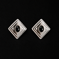 Pair of Ziggurat Stepped Stud Earrings by Lil Cacti, art deco earrings with a black stone in a stepped dark-silver diamond frame, front view